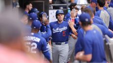 Freddie Freeman of the Los Angeles Dodgers celebrates with teammates after hitting a home run during a game against the Chicago White Sox at Rate Field on Sunday, June 14, 2026
