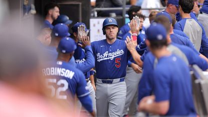 Freddie Freeman of the Los Angeles Dodgers celebrates with teammates after hitting a home run during a game against the Chicago White Sox at Rate Field on Sunday, June 14, 2026