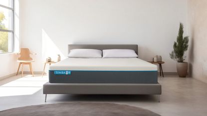 Simba hybrid mattress on a bed in a white bedroom