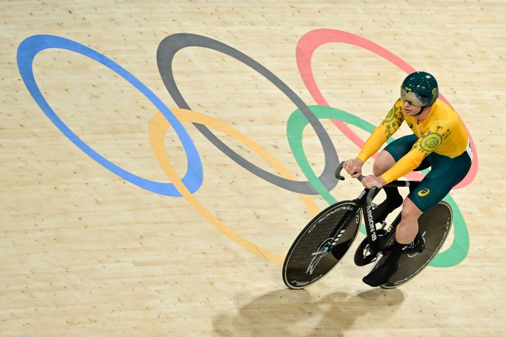 Australia's Matthew Richardson competes in a men's track cycling sprint qualifying round of the Paris 2024 Olympic Games at the Saint-Quentin-en-Yvelines National Velodrome in Montigny-le-Bretonneux, south-west of Paris, on August 7, 2024. (Photo by John MACDOUGALL / AFP)