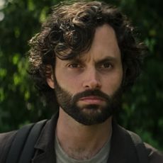 penn badgeley as joe goldberg with a beard in a still from you season 4