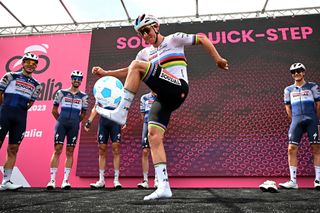 Remco Evenepoel with a football at sign-on before stage 6 of the Giro d'Italia