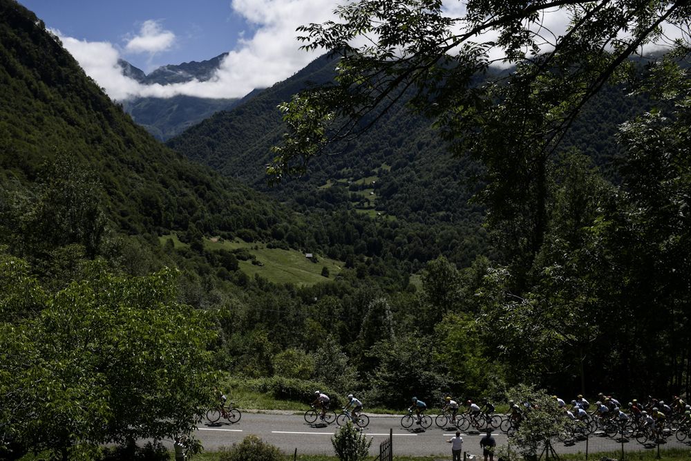 The pack rides during the 101 km 13th stage of the 104th edition of the Tour de France