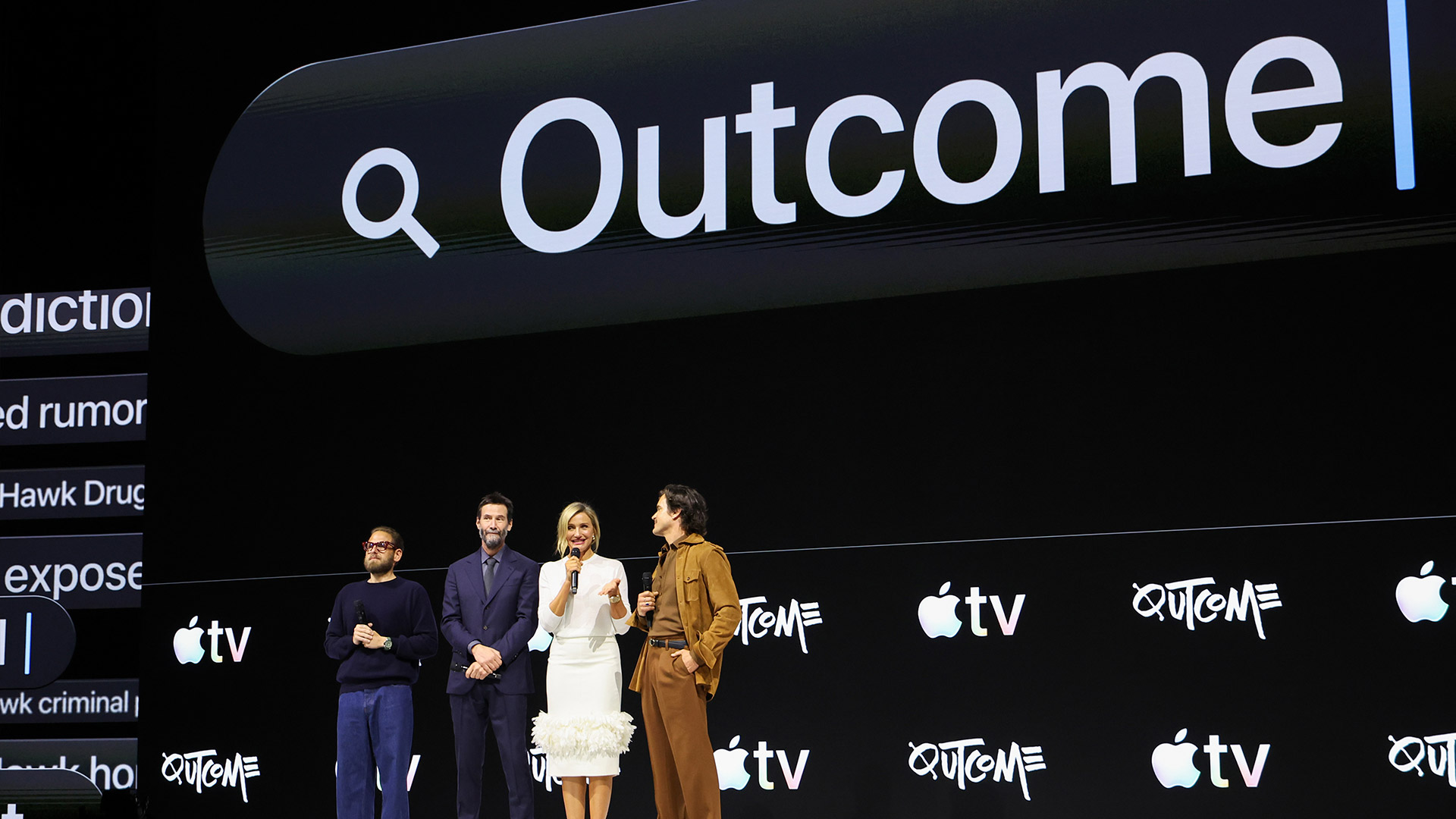 The cast of Outcome on stage at an Apple TV press event.