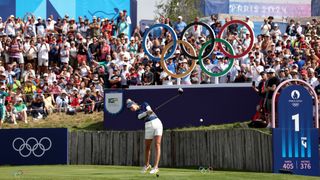 Nelly Korda hits her tee shot on the 1st at the Olympics