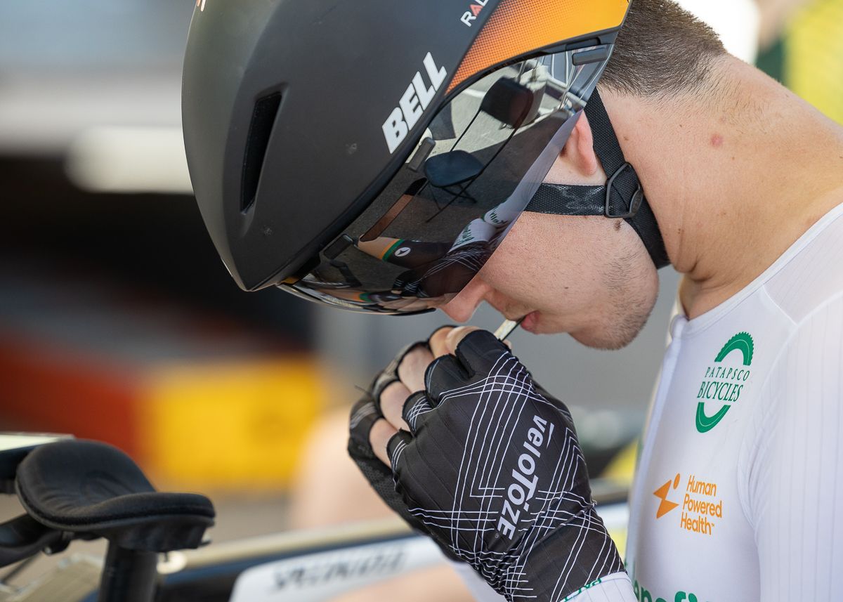 Patrick Welsh (Kelly Benefits Strategy Elite Cycling) takes on a last minute gel before dropping onto the course.