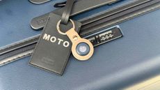 Motorola Moto Tag attached to a luggage.