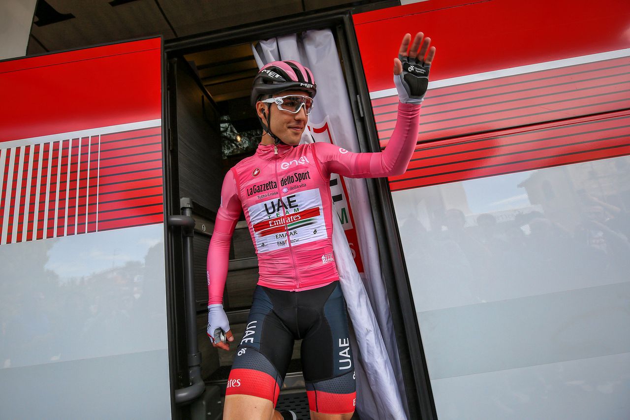Race leader Valerio Conti (UAE Team Emirates) emerges from his team bus