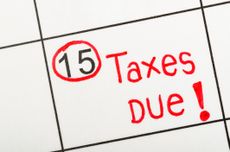 Rendering of calendar with the 15th circled in red for taxes due date