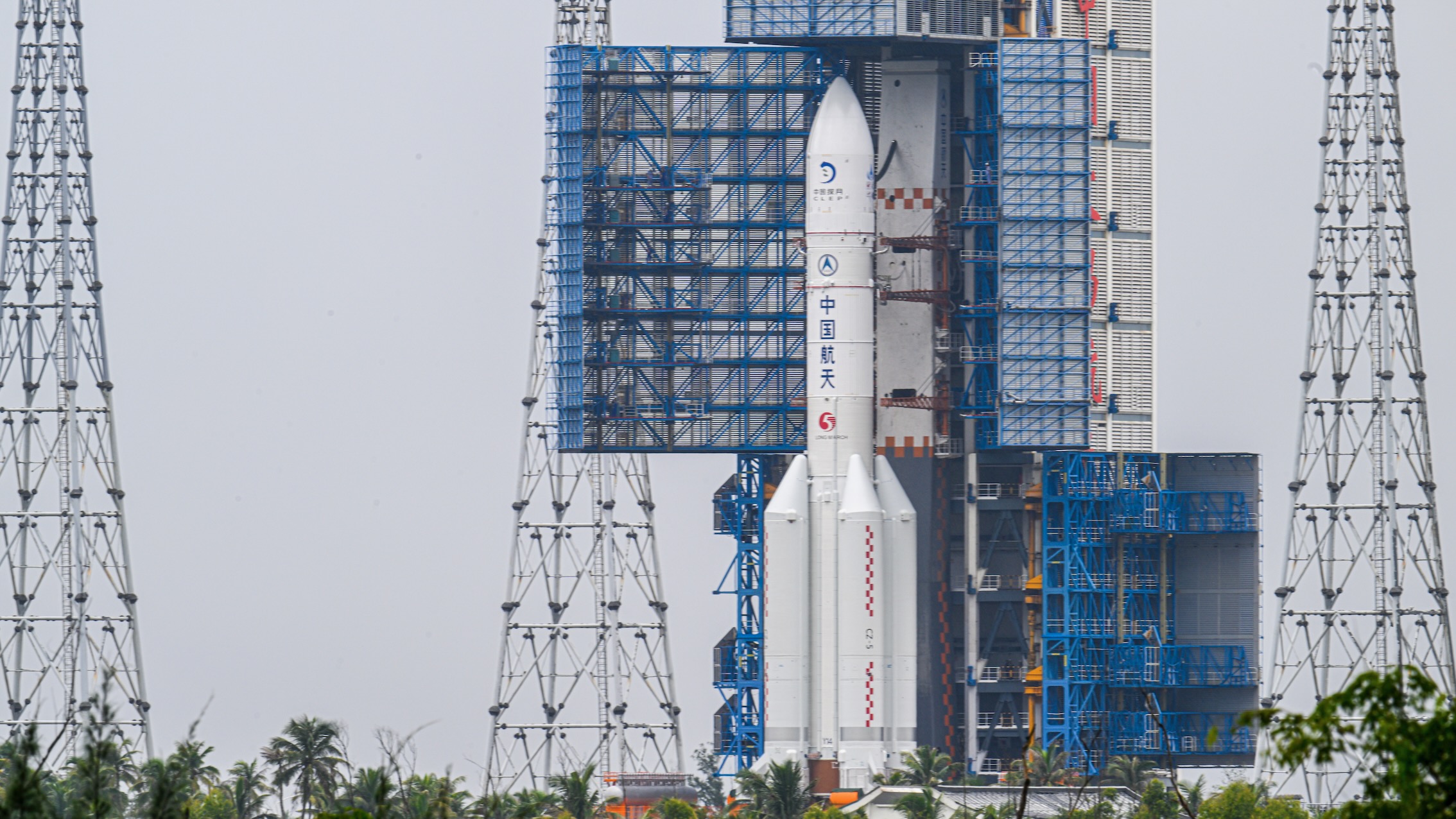 China's Chang'e 7 lunar probe and its Long March 5 rocket are transferred to their pad at the Wenchang Spacecraft Launch Site on Aug. 19, 2026 in Wenchang, Hainan Province.