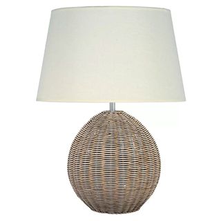 table lamp with wicker base and cream shade