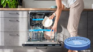A woman loading a dishwasher with the Tom's Guide Clean Smarter logo
