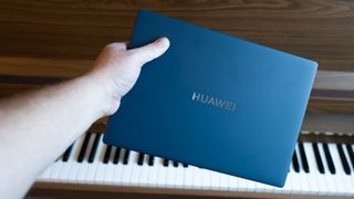 A blue Huawei MateBook X Pro laptop