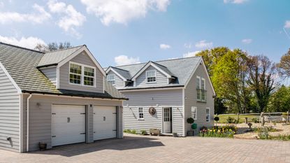 Grey shiplap house with converted garage