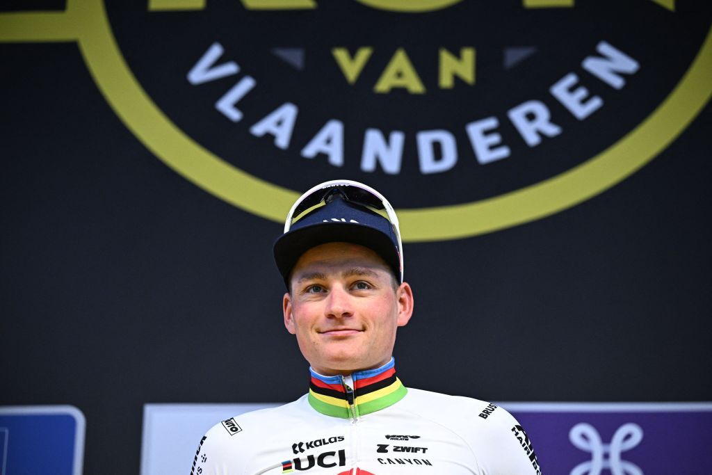 Dutch Mathieu van der Poel of Alpecin-Deceuninck celebrates on the podium after winning the 'Ronde van Vlaanderen/ Tour des Flandres/ Tour of Flanders' one day cycling event, 270,8km from Antwerp to Oudenaarde, Sunday 31 March 2024.
BELGA PHOTO JASPER JACOBS (Photo by JASPER JACOBS / BELGA MAG / Belga via AFP)