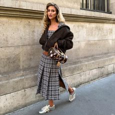 Influencer wearing Adidas sneakers in Paris