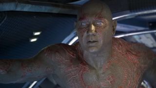 A close up of Dave Bautista in blue makeup as Drax in Guardians of the Galaxy