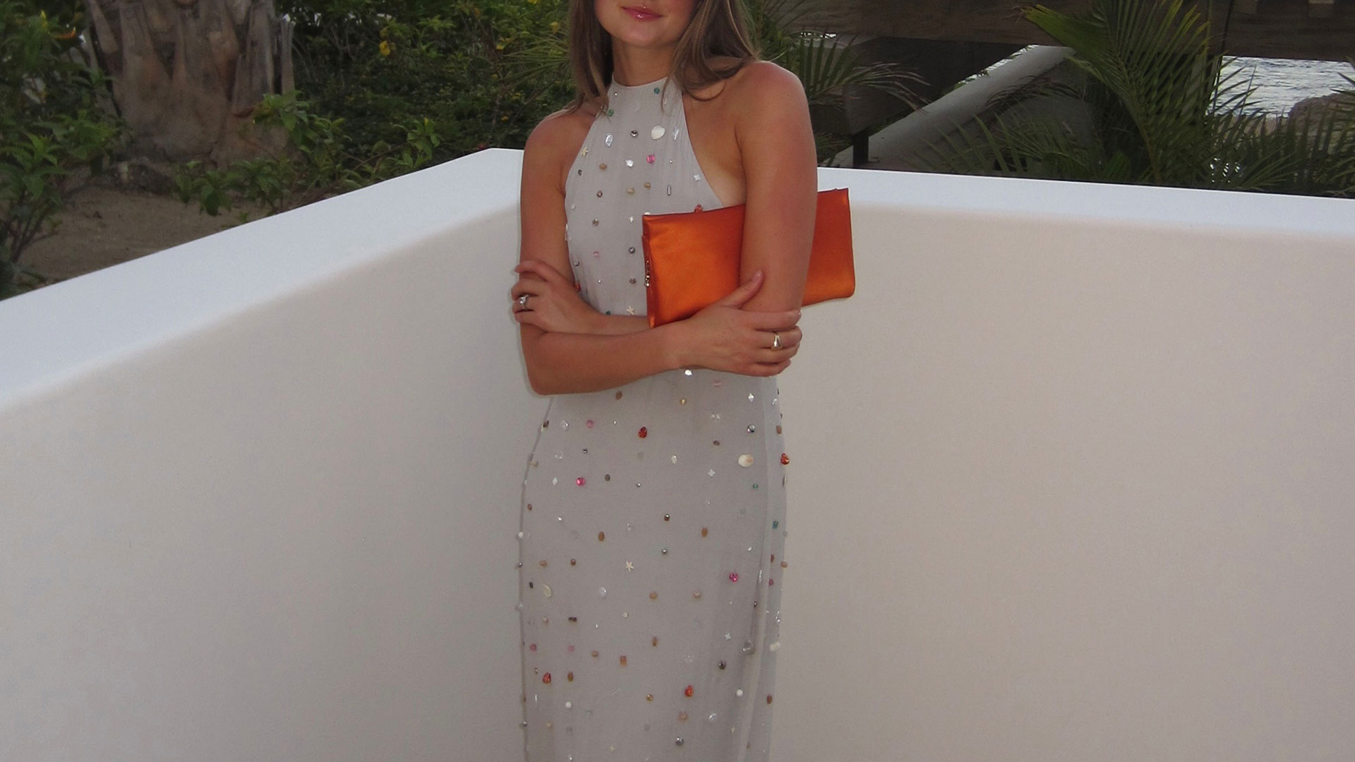 @styledsara in a Bernadette Francine Pearl-Embellished Halterneck Dress.
