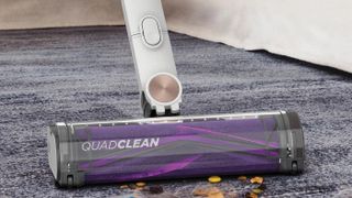 Cleaning head of the Shark Cordless Detect Pro on a dirty rug