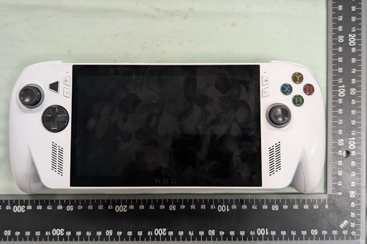 Photographs of an Asus ROG handheld gaming PC taken from FCC filings, showing the device's dimensions, new design, and button and port layout.