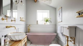 Elegantly rustic bathroom trend cottagecore with ornate fixtures and fittings and pink bath