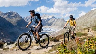 Rab Cinder mountain bikers in the alps
