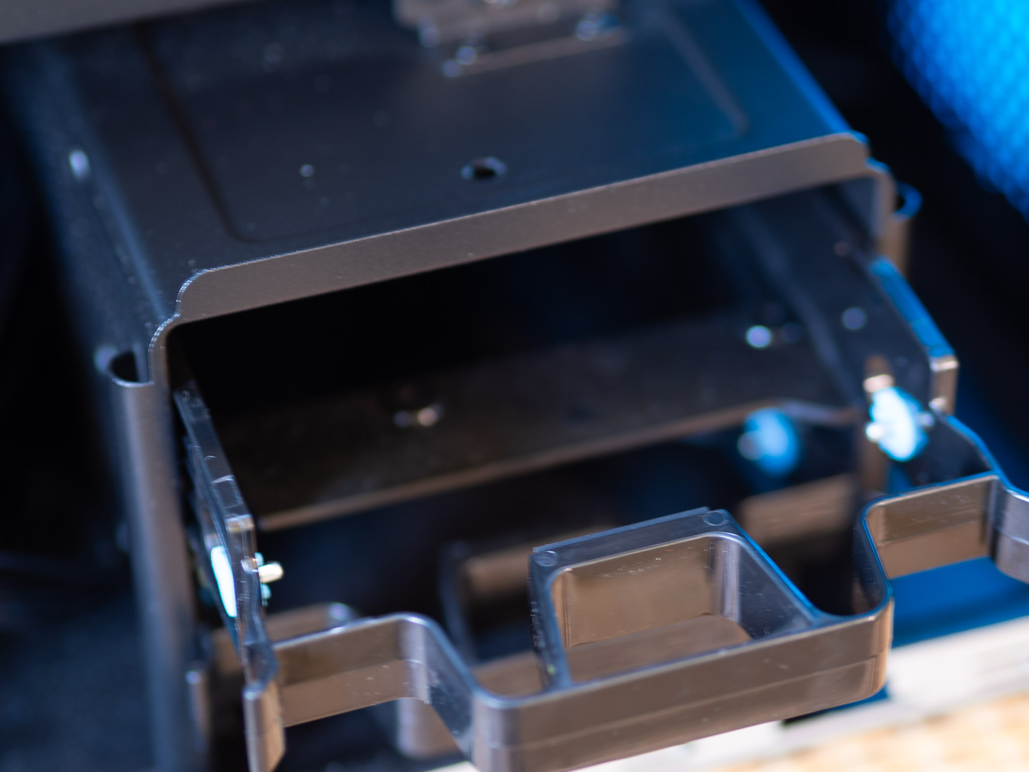 Acer Predator Orion 7000 gaming desktop PC on a wooden desk and yellow background