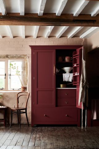 a red kitchen cabinet