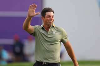 Viktor Hovland waves to the crowd