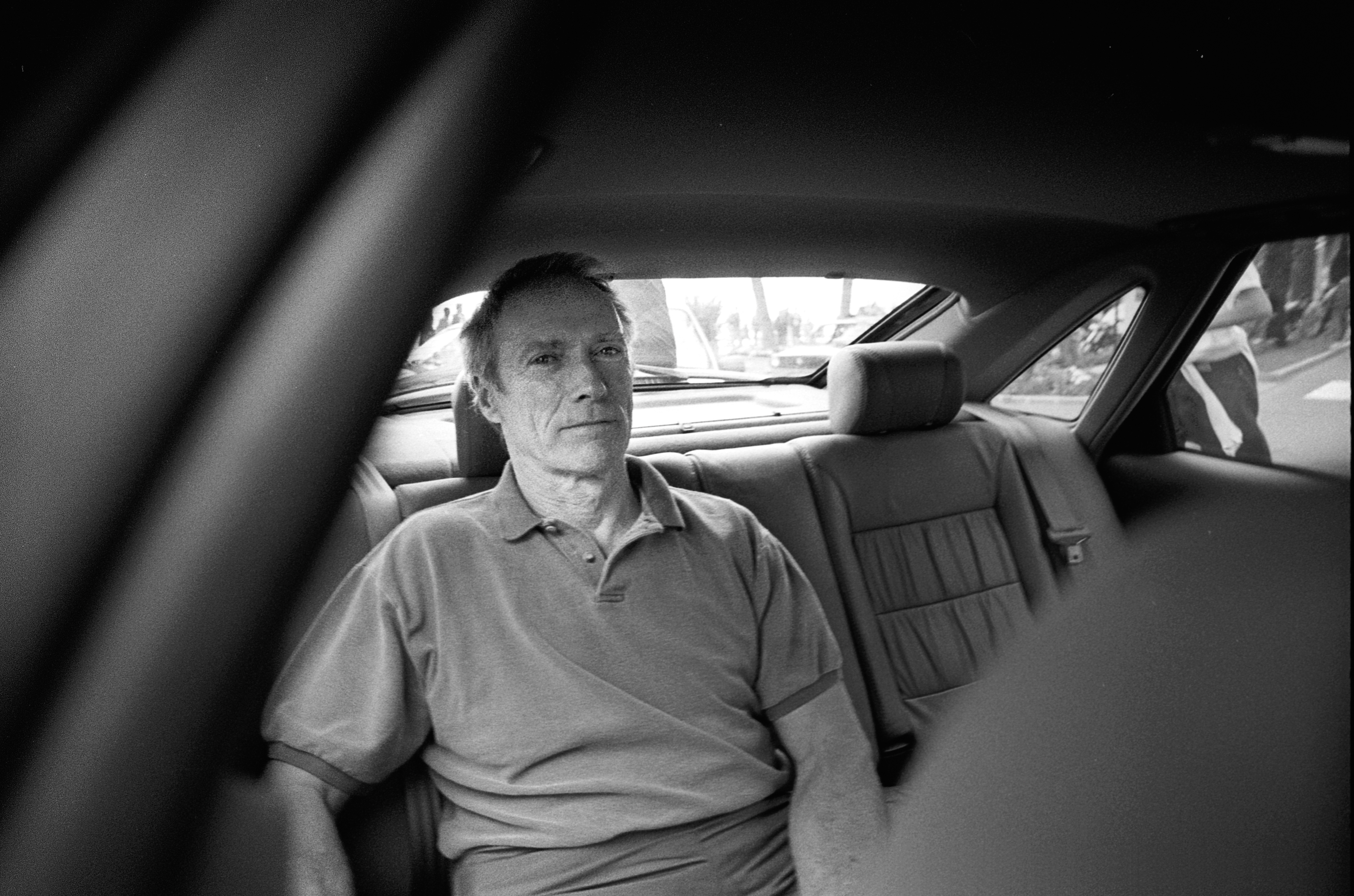 Clint Eastwood in back of car
