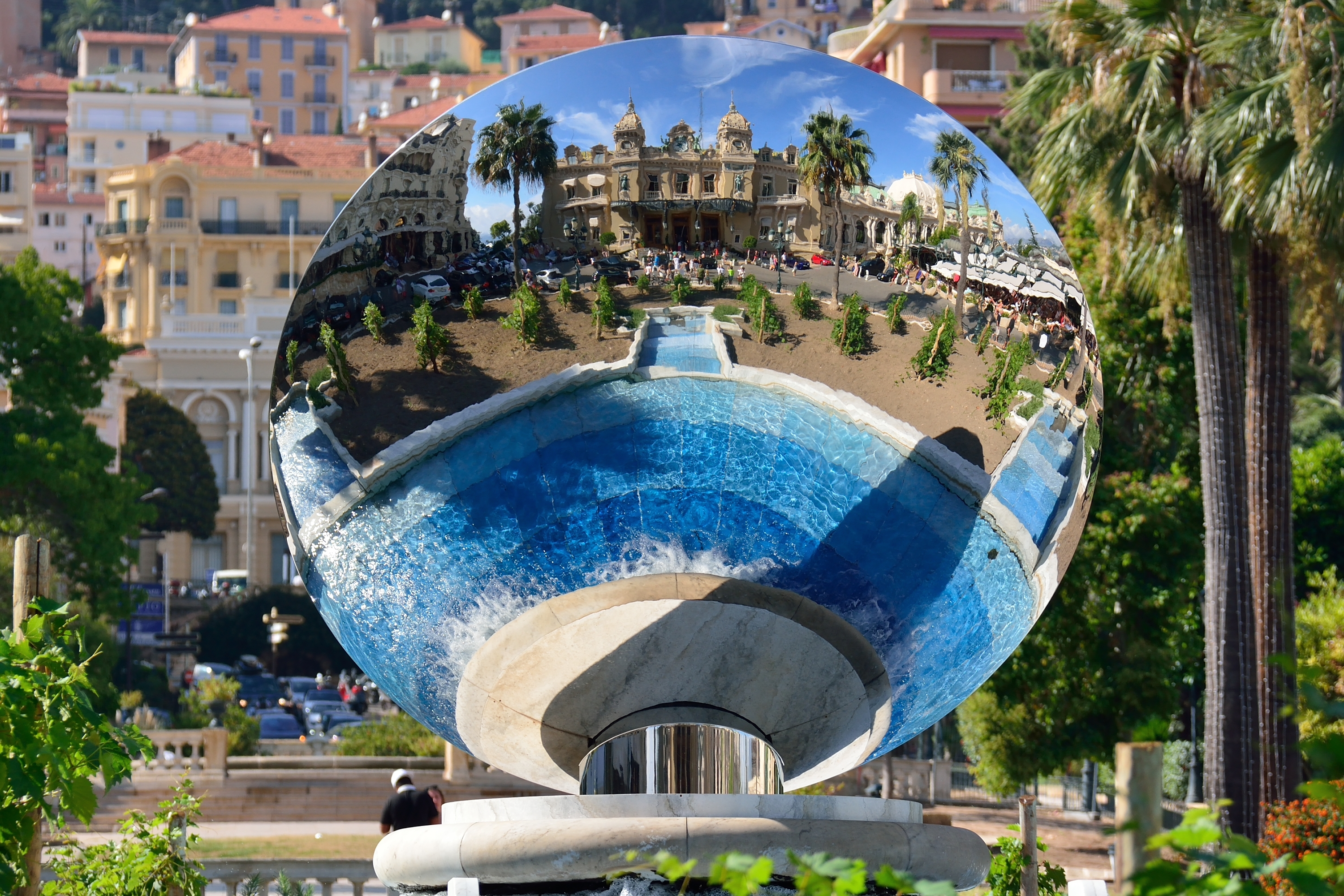 A public sculpture called 'Sky Mirror' consisting of a concave disc that reflects its surroundings