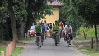 Michael Cramer leads riders on the Berlin Wall trail