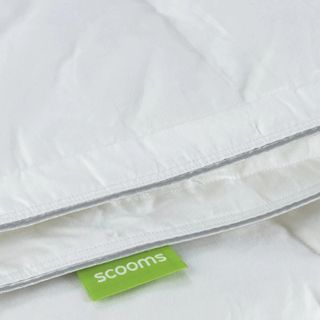 Scooms feather and down duvet with a green label showing