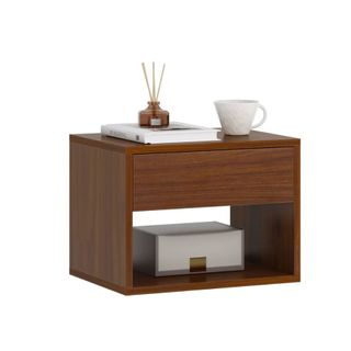 A floating nightstand in walnut brown