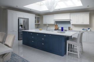 large kitchen island with roof lantern above