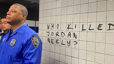 Police officer at Jordan Neely protest