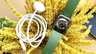 Apple Watch 7 with charger