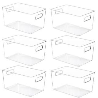 six clear plastic storage bins with cut out hadles