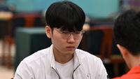 HANGZHOU, CHINA - SEPTEMBER 28: Ryo Ichiriki of Team Japan competes against Shin Jin-seo (L) of Team South Korea in the Go - Men's Individual Bronze Medal Match on day five of the 19th Asian Games at Hangzhou Qi-Yuan (Zhili) Chess Hall on September 28, 2023 in Hangzhou, Zhejiang Province of China. 