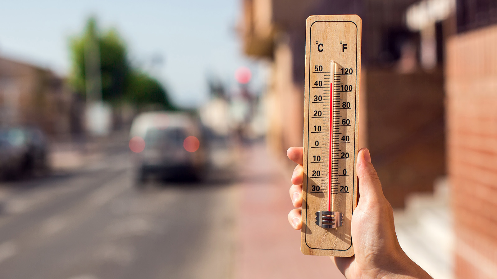 A thermometer outdoors in a heatwave