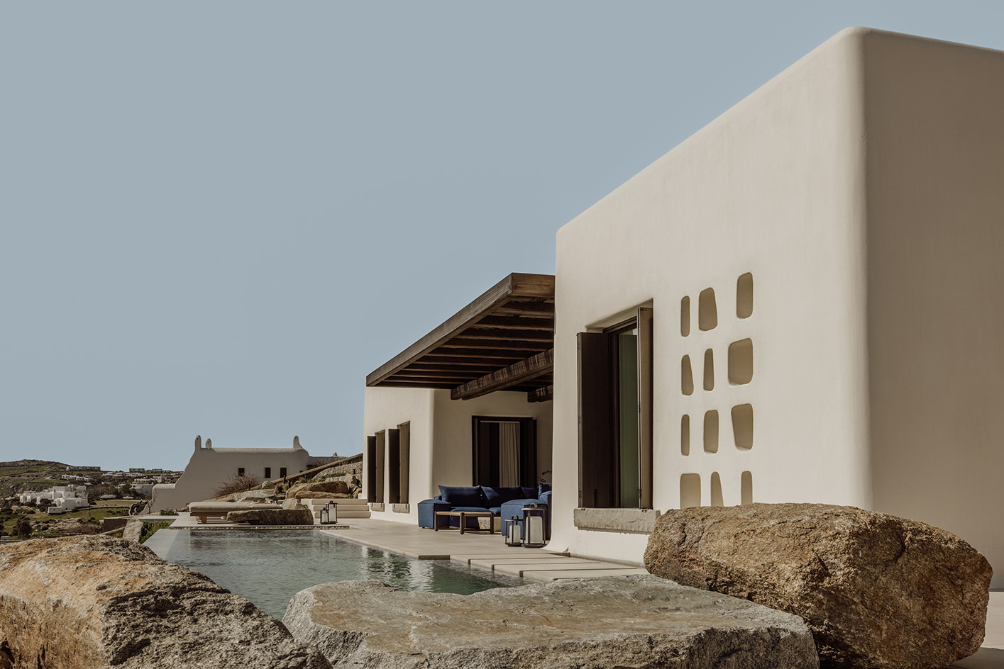 Anamesa by K-Studio, contemporary Mykonos House within white and minimalist yet sleek forms and inside outside living arrangements