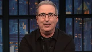 John Oliver looking horrified at the camera