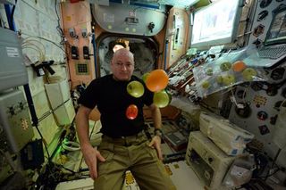 Astronaut Scott Kelly enjoys fresh fruit on Day 100 of his one-year trip aboard the International Space Station. This week Kelly talked with reporters about what life is like in orbit.