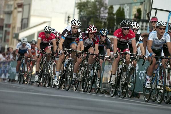 The peloton head up the home straight in the final laps of the 44 kilometre mens' elite criterium championship.