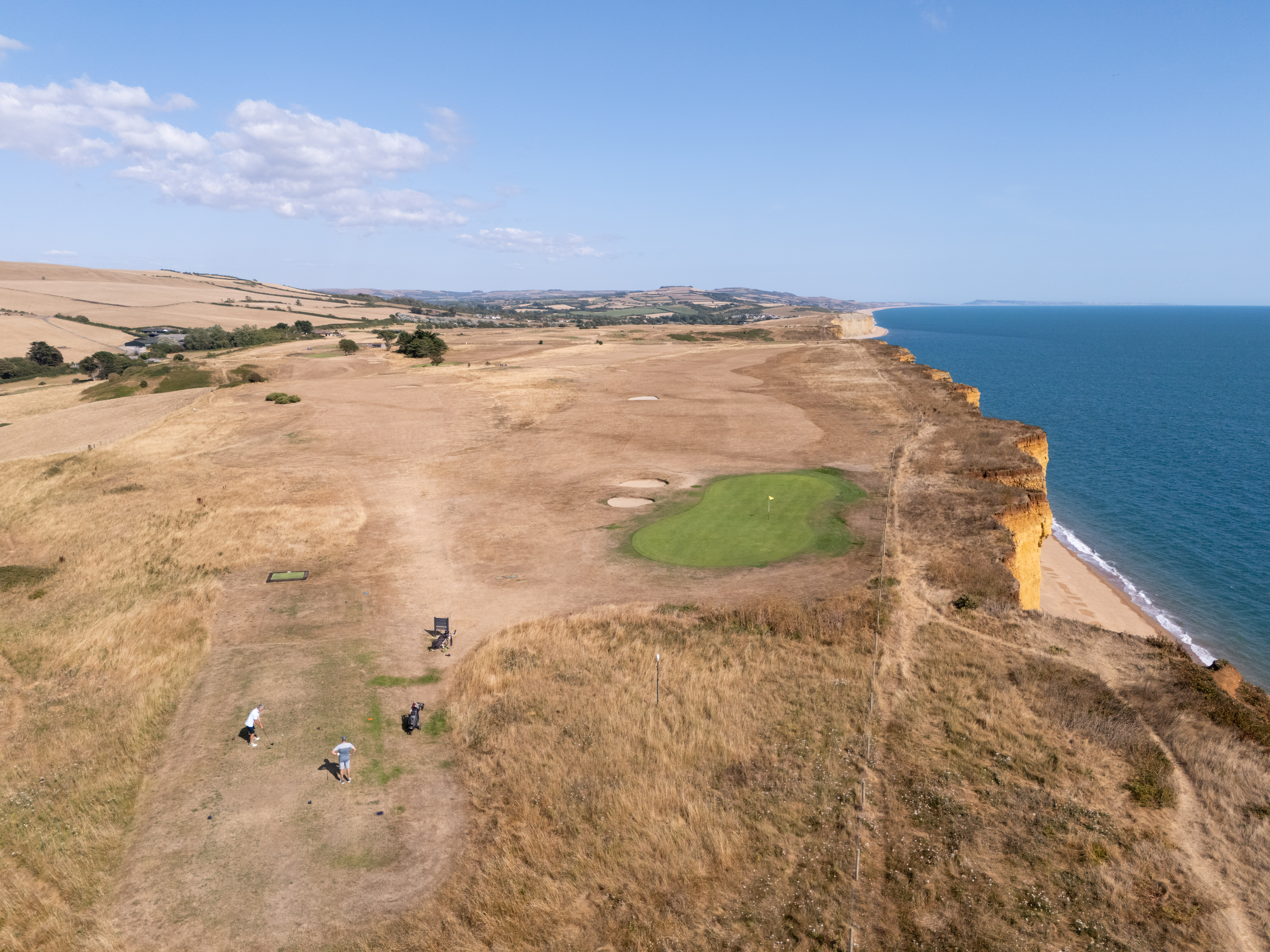 A golf course by the sea seen during the UK summer drought in 2026