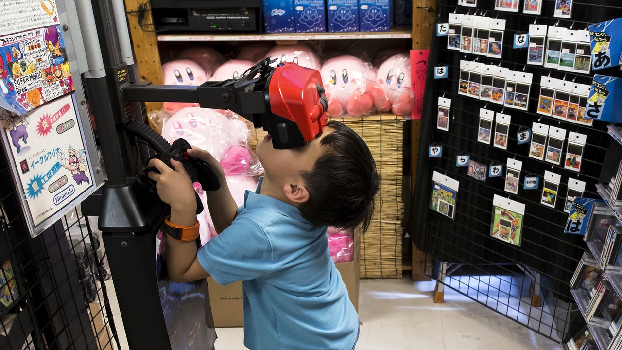 Nintendo Virtual Boy in use by child in Japanese games shop