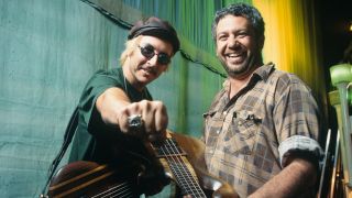 Musicians Les Claypool (left) and Mike Watt (right) meet for a joint portrait backstage on August 4, 1995 in New York City, New York.