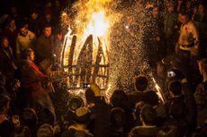 All fired up for the Ottery St Mary Tar Barrel Festival in Devon. © Getty Images