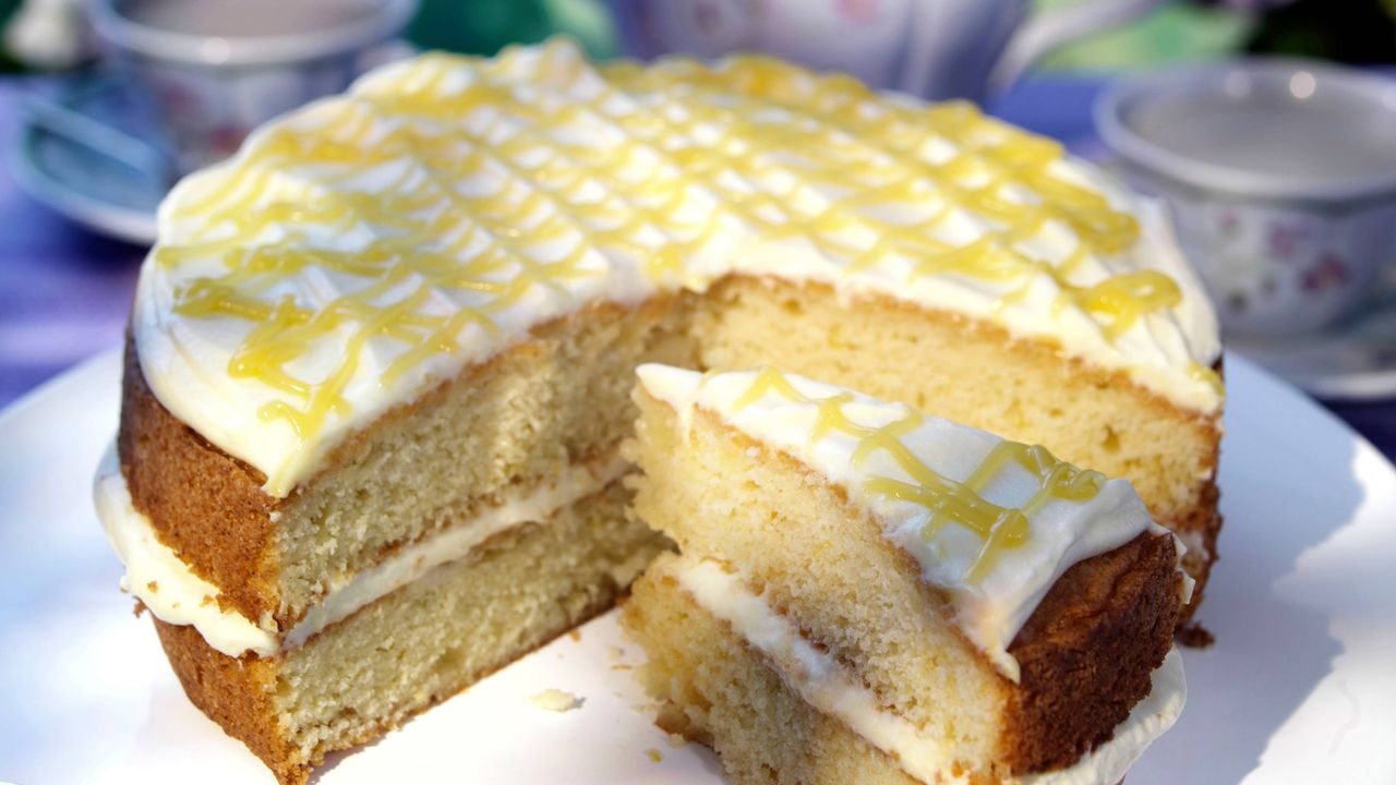 Lemon cream cake served outside on a sunny day