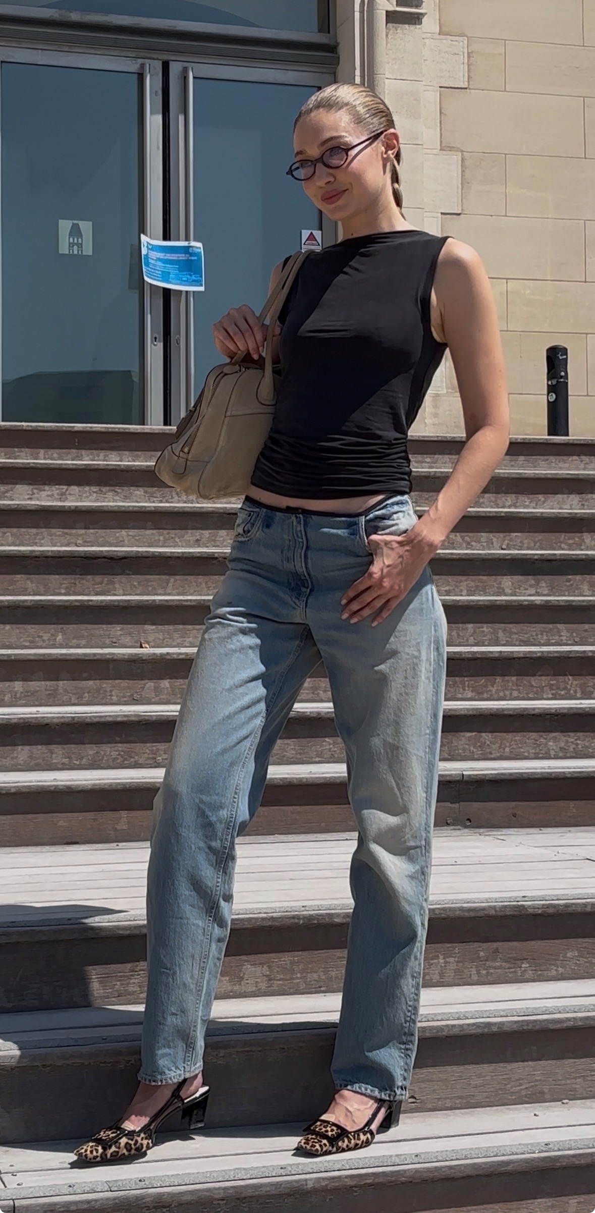 Gigi Hadid was spotted after the Balenciaga Paris Couture Week show in French girl denim and slingback leopard-print kitten heels